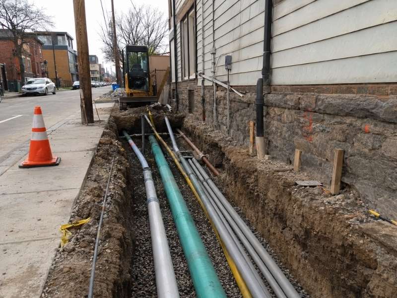 Utility coordination on a narrow Denver Colorado infill site with exposed underground utility lines and limited space for new connections